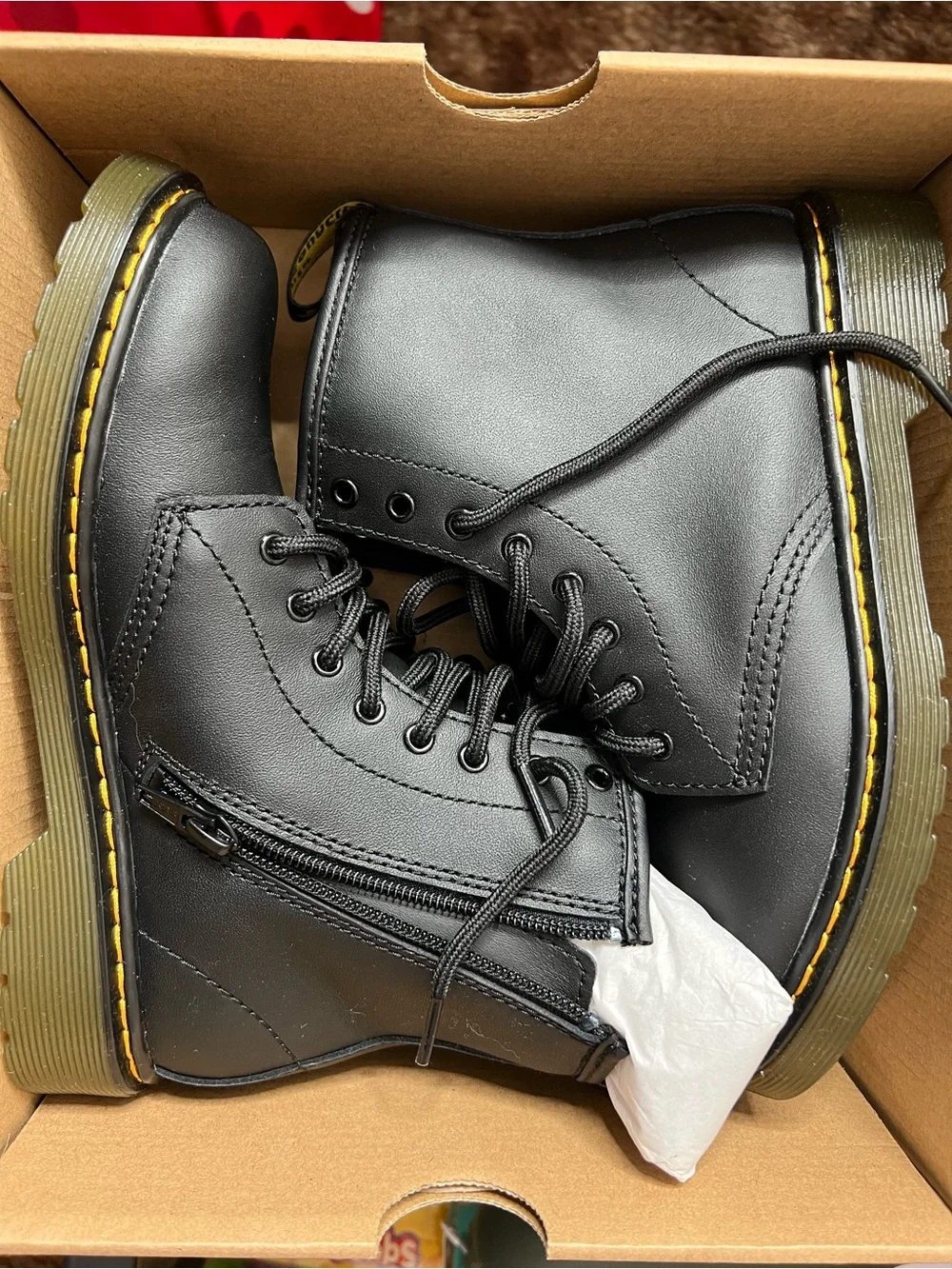 Dr. Martens Black Leather Lace-Up Kids Boots with Yellow Stitching